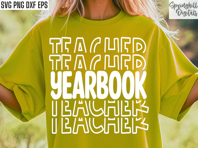 May include: A yellow t-shirt with the text "TEACHER YEARBOOK TEACHER" in white outlined letters.