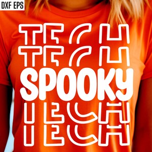 May include: Orange t-shirt with white text that reads "Tech Spooky Tech" in a blocky font.