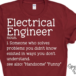 May include: Red t-shirt with white text that reads "Electrical Engineer noun. 1. Someone who solves problems you didn't know existed in ways you don't understand. see also: "Handsome" "Funny" Springhill Digitals"