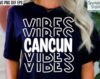May include: A black t-shirt with white text that reads "Cancun Vibes" in a retro font style.
