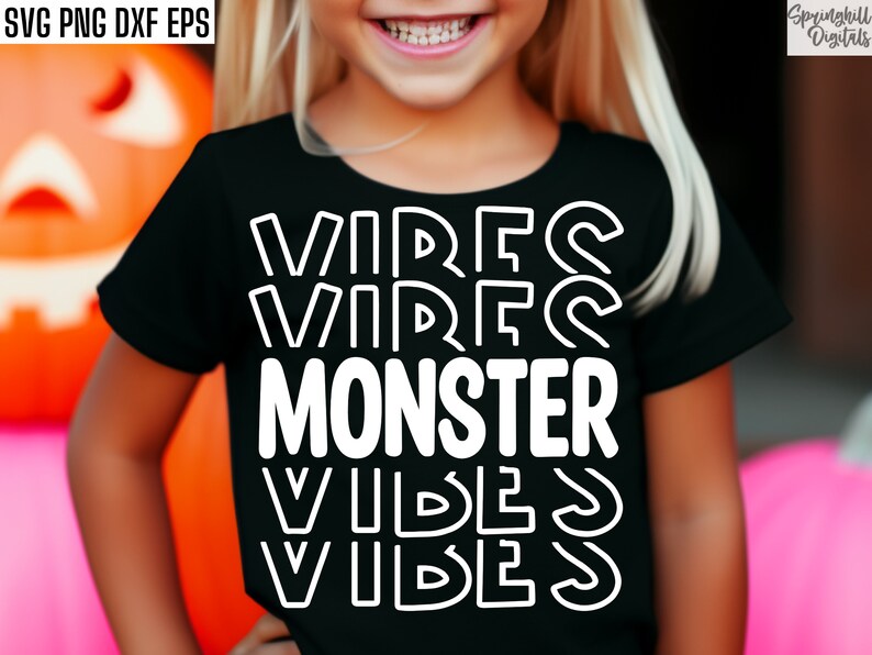 May include: A black t-shirt with white text that reads "VIBES VIBES MONSTER VIBES VIBES".