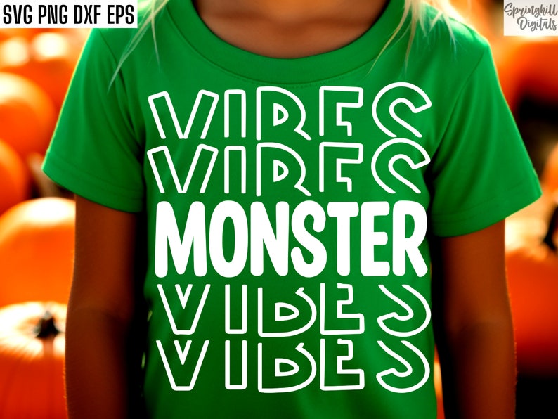 May include: A green t-shirt with the text "VIBES VIBES MONSTER VIBES VIBES" in white outlined letters.