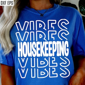 May include: A blue t-shirt with white text that reads "VIBES HOUSEKEEPING VIBES".