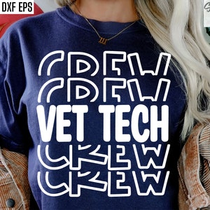 May include: A navy blue t-shirt with the text "VET TECH CREW" in white, repeated in a stacked, layered design.