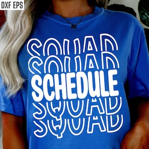 May include: A royal blue t-shirt with a white graphic design that says "Squad Schedule" in a retro, wavy font.