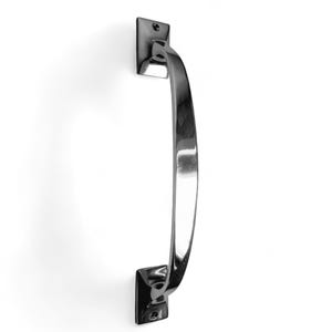May include: A black metal door handle with a curved design. The handle is attached to a square base.
