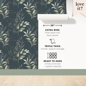 May include: A dark green wallpaper with a watercolour pattern of leafy branches. The wallpaper is 26 inches wide and has a triple thick, smooth, opaque coverage. It is ready to hang and arrives cut-to-size with pattern matching.