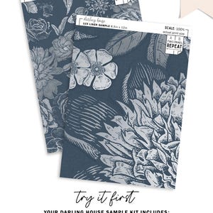 May include: Two 8.5 inch by 12 inch samples of a floral wallpaper pattern printed on lux linen peel and stick. The pattern features a blue background with white flowers. The text "darling house" and "LUX LINEN SAMPLE" is printed on the samples. The text "SCALE: 25% for illustration only" and "SCALE: 100% actual print size" is printed on the samples.