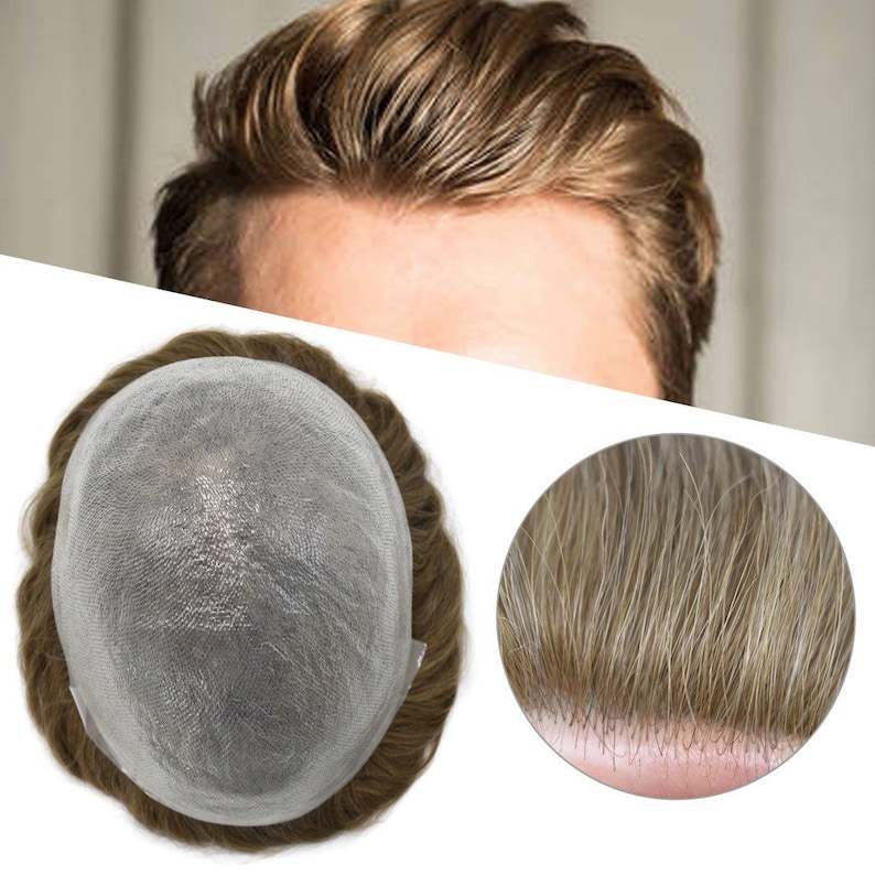 May include: A close-up of a hairpiece with light brown hair, a mesh base, and a natural hairline. The image also shows a person with light brown hair. The hairpiece is designed to blend seamlessly with natural hair.