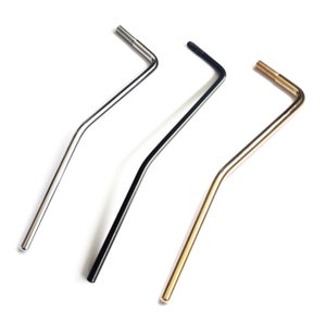 May include: Three guitar tremolo arms in different finishes: chrome, black, and gold.