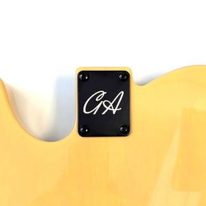 GA Black Neck plate displayed on a body.