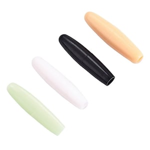 May include: Set of five guitar knobs in different colors: black, white, beige, light green, and a darker green. The knobs are made of plastic and have a smooth, rounded shape.