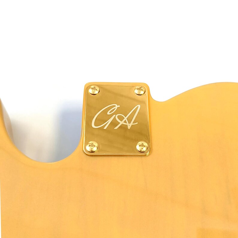 GA Gold Neck plate displayed on a body.
