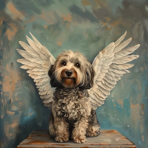 May include: A small, fluffy, gray and white dog with white angel wings sits on a wooden table against a blue and brown painted background.