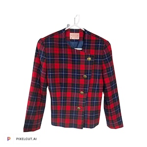 May include: Red and blue plaid blazer with gold buttons. The blazer has a unique asymmetrical design and a collarless neckline.