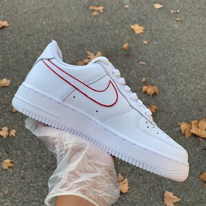 Air force 1s red swoosh cheap