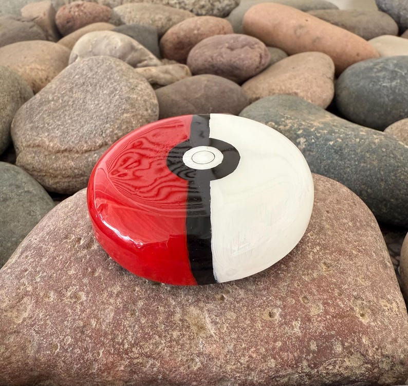 A Poké Ball, Also Known as a Monster Ball, Pokemon Ball - Stone by Val ...