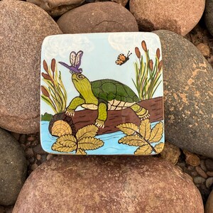 Hand Painted Turtle on a Log with a Dragonfly on his nose, Painted on a Santorini Sheer - Stone by Val