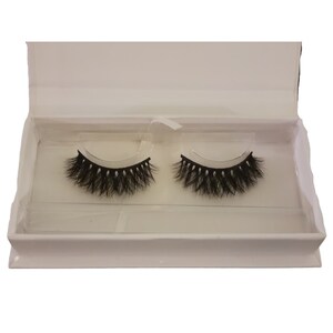 May include: Two pairs of black false eyelashes in a white box with a clear plastic insert.