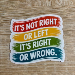 May include: A sticker with the text "IT'S NOT RIGHT OR LEFT IT'S RIGHT OR WRONG." The text is layered in red, yellow, green, and blue brushstrokes on a white background.
