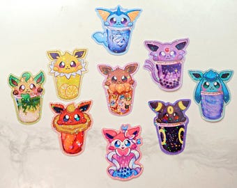 May include: Ten colorful stickers featuring different Pokemon characters in bubble tea cups. The stickers are holographic and have a glossy finish.