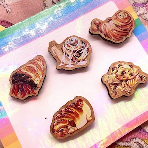 Pastry Animals 1" Wooden Pin Set - Croissant Seal, Cinnamon Roll Snail, Cornet Hermit Crab, Pugloaf, and Muffin Turtle - Set of Five