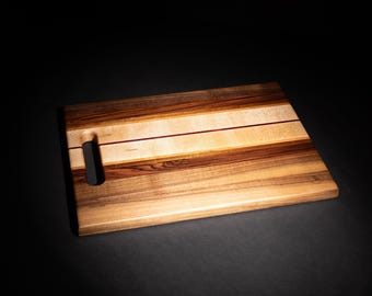 Tagliere per salumi da 16,5 x 12 x 1 pollici realizzato in legno di noce, sapelli, ciliegio, acero ambrosia, acero e canarino.