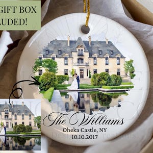 May include: A white ceramic ornament featuring a watercolor image of a castle with a couple. The ornament includes the text "The Williams", "Oheka Castle, NY", and the date 10.10.2017. A small image of the castle is in the lower left corner.