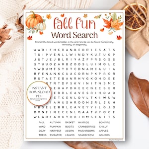 May include: A printable fall fun word search game sheet featuring orange pumpkins, autumn leaves, and a grid of letters. The text reads fall fun Word Search, followed by a list of words including fall, autumn, basket, hayride, bonfire, wind, pumpkin, boots, cranberries, chilly, cozy, harvest, acorn, mushrooms, apples, trees, sweater, leaves, scarecrow, and gourds.