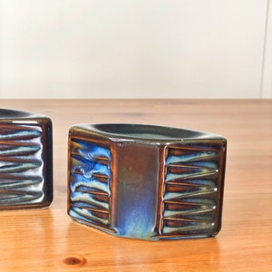 A pair Søholm Denmark stoneware designed by Einar Johansen in 1964, Handmade candlestick holders. Glazed Blue and Brown Contrast