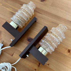 Pair of wall sconces with thick decorative amber color glass shades - Danish mid century design wall lamps 70s