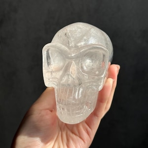 Hand Carved Clear Quartz Skull with Rainbow Inclusions