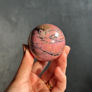 Rhodonite Sphere: Pink Crystal Ball, Metaphysical Decor