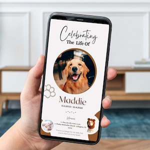 May include: A smartphone displaying a memorial card for a dog named Maddie. The card features a photo of Maddie, the dates "5.11.2010 - 10.4.2022", and the text "Celebrating The Life Of".
