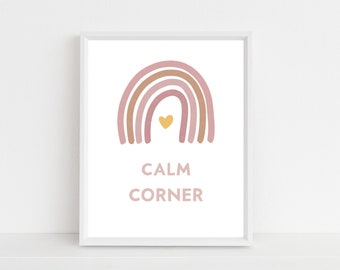 Puede incluir: Un diseño de arte de pared imprimible con un arcoíris rosa y marrón con un corazón dorado en el centro. El texto "CALM CORNER" está debajo del arcoíris.