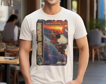 May include: White t-shirt with a vintage Sega Saturn game cartridge design featuring a spaceship and the text "Galactic Attack".