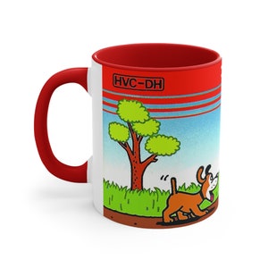 May include: White ceramic mug with a red interior and handle. The mug features a cartoon image of a dog running through a grassy field with a tree in the background. The text "HVC-DH" is printed on the mug.