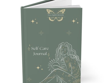 May include: A green self-care journal with a gold butterfly logo and the text "Free Spirit Lifestyle". The cover features a line drawing of a woman with a celestial tattoo design holding a sun.
