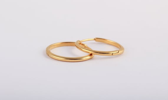 Plain round store gold earrings