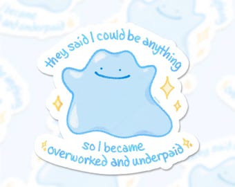 May include: A blue and white sticker with a cartoon blue blob character and the text "They said I could be anything so I became overworked and underpaid."