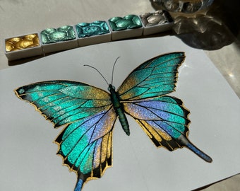 Mariposa turquesa brillante