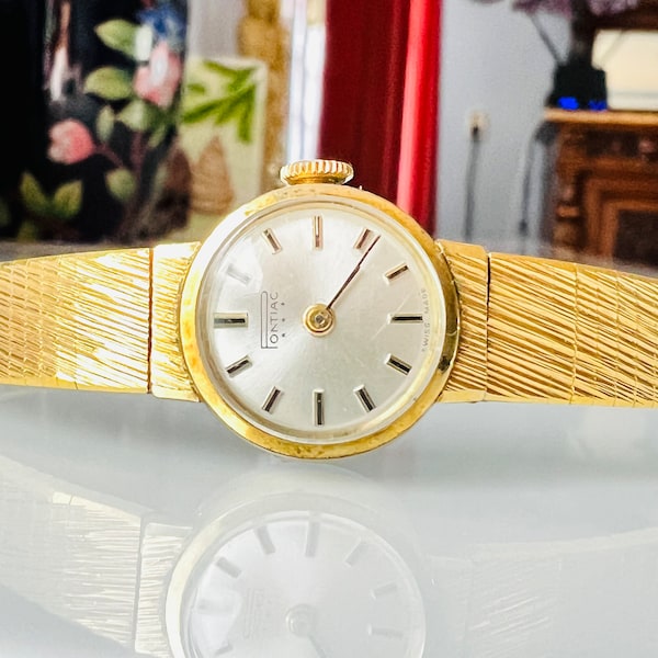 Rare vintage Swiss watch Pontiac. Wrist Ladies Watch on Gold plated strap. The watch runs perfectly. 1970's