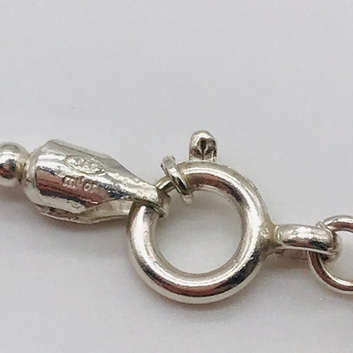 Shops Modernist silver pendant on a chain. 60's.