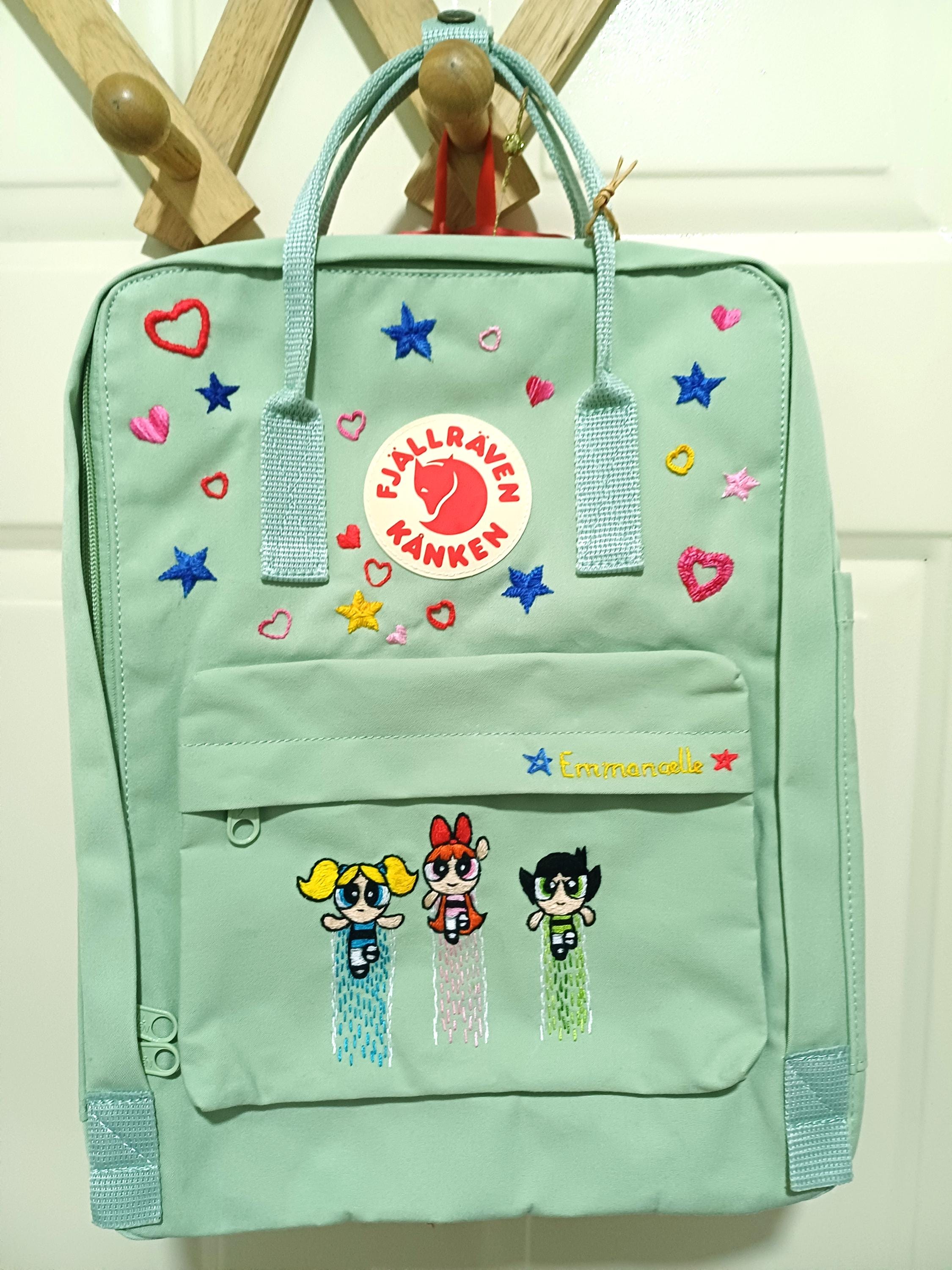 Ace family merch bag( looks like a kanken bag) Did Fjallraven change logos at any point? My other bag from  main image 3