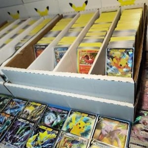 Pokémon TCG Mystery Card Bundle - 50 Completely Random Cards Plus Guaranteed Ultra Rare Hit!