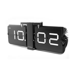 May include: A black flip clock with white numbers displaying 10:02 AM. The device features a central vertical support bracket with the brand name CLOUDNOLA printed in white. The clock has two separate sections for hours and minutes with visible flip panels.