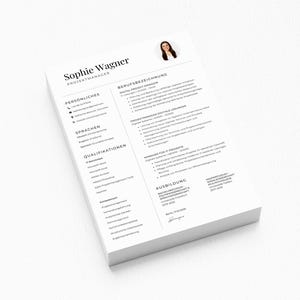 May include: A stack of white resume papers with black text. The top sheet features the name "Sophie Wagner" and the title "Projektmanager." A small headshot is in the upper right corner. The resume details experience, skills, and education.