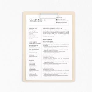 May include: A resume template for a Registered Nurse, featuring the name "Olivia Smith" at the top. The document is on a clipboard with a metal clip. The resume includes sections for education, licenses, skills, and professional overview.