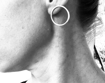 Sterling silver circle earrings.