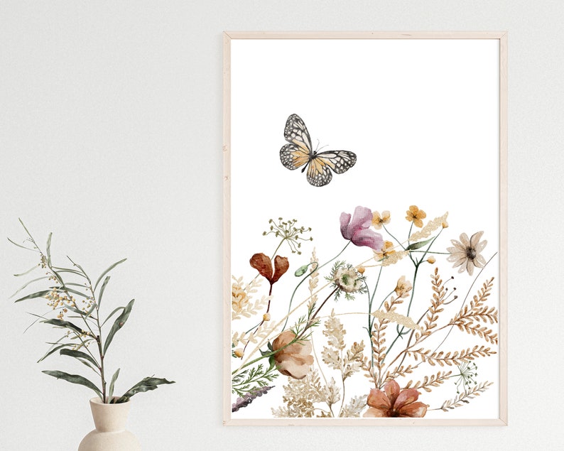 May include: A watercolor painting of a butterfly flying over a bouquet of wildflowers. The flowers are in shades of pink, brown, and white, and the butterfly is yellow and black.